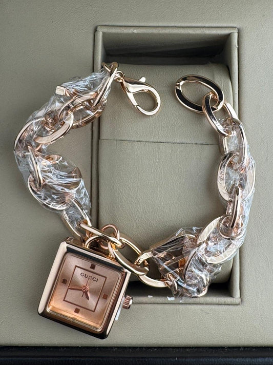 Guci jewelry watch designed in a "charm bracelet"